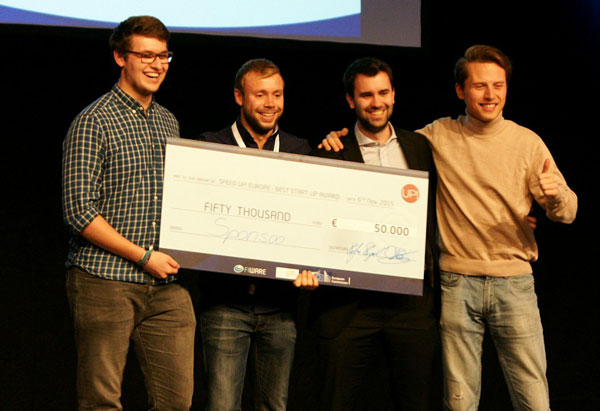 The Sponsoo team receives a €50,000 cheque as prize money in a startup competition. The Sponsoo team receives a €50,000 cheque as prize money in a startup competition.